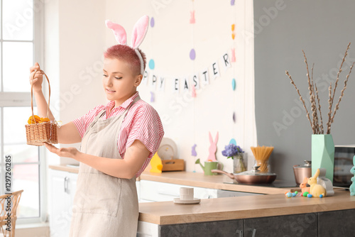 Young woman with bunny ears...