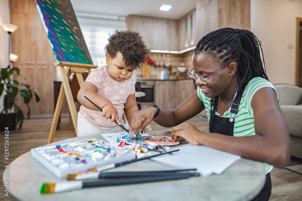 Creative bonding between a mother and child in a cozy studio Creative bonding between a mother and child in a cozy studio