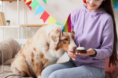 Woman giving cake to cute A...