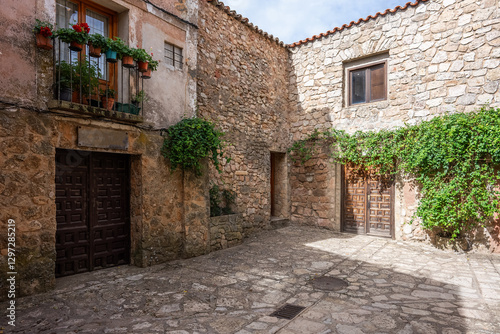cozy narrow streets of ancient Roman town Medinaceli showcase ancient cobblestone architecture and peaceful ambiance
