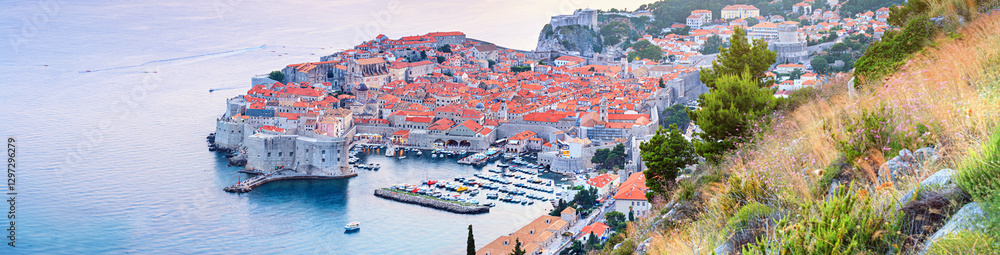 Panoramic top view of the Old Town of Dubrovnik, banner, panorama in beautiful evening light at sunset, the Adriatic coast of Croatia