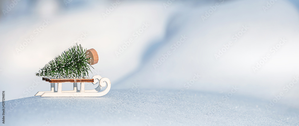 Christmas winter background, banner - view of a decorative Christmas tree with a sled on a snowdrift in a winter forest, copy space for text