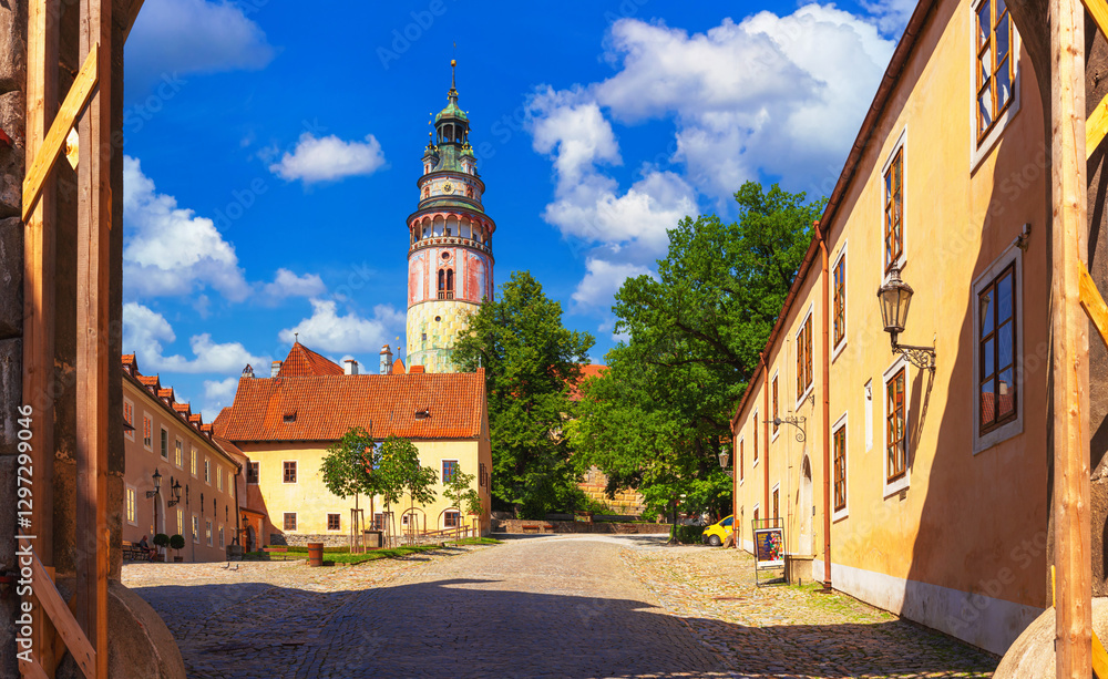 Summer cityscape - view of the courtyard of Cesky Krumlov Castle from the Cervena brana (Red Gate), Cesky Krumlov, Czech Republic