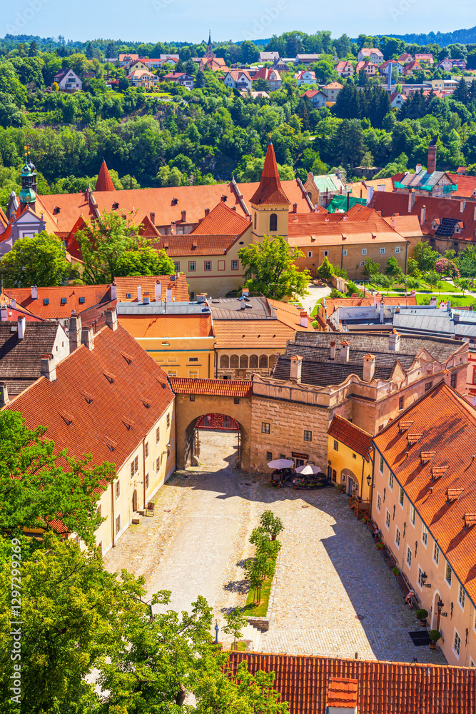 Summer cityscape - top view of the courtyard of Cesky Krumlov Castle and historic district Latran of Cesky Krumlov, Czech Republic