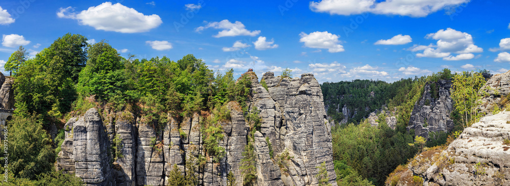 Beautiful landscape, panorama, banner - view of the Bastei rock formations and the Bastei Bridge in the Elbe Sandstone Mountains, in Saxony, Germany