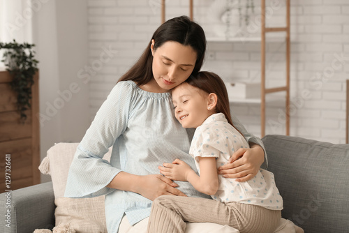 Pregnant mother and young d...