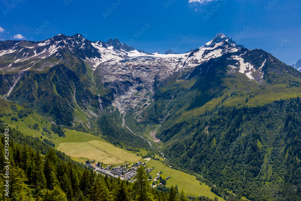 Naklejka premium Alps scenic landscape on Tour du Montblanc. Rocky and snow summit peaks of the Alps on the trekking route TMB around Mont Blanc in Chamonix and Courmayeur. Alpine scene with mountains and lakes