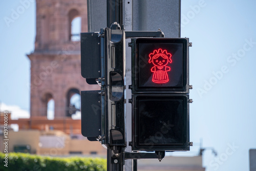 Obraz na płótnie Unique Traffic Lights in Queretaro City, Mexico. Stepping girl called Queretana is a feature of Queretaro w salonie
