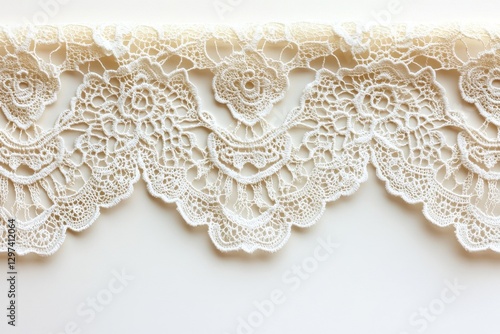 Decorative lace trim showcases intricate floral patterns, perfect for crafting or garment embellishment