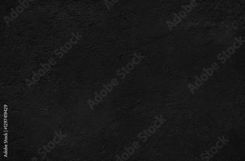 Dark black plastered wall background for design. Modern concrete wall texture.