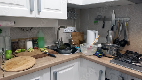 A mess in the kitchen, dirty dishes on the table, scattered things, unsanitary conditions. kitchen is untidy, everyday life