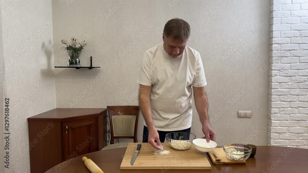 Dough video Recipe for making steps. fourth step. Kneading dough on wooden table. Step by step recipe. Healthy cooking at home in the kitchen according to recipe Dough video Recipe for making steps. fourth step. Kneading dough on wooden table. Step by step recipe. Healthy cooking at home in the kitchen according to recipe