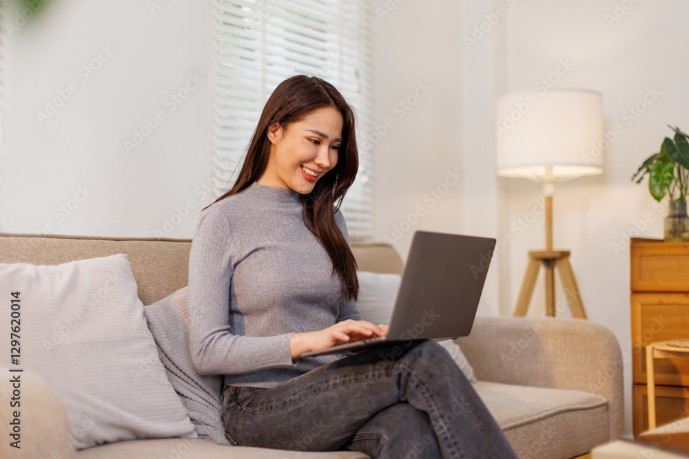 Beautiful freelancer happy asian thai lady working on laptop and planning and online at home
Beautiful freelancer happy asian thai lady working on laptop and planning and online at home
