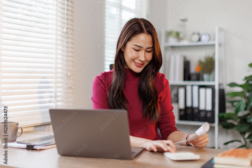 Calculator, budget and asian woman in home office with laptop, financial management and checking bills. Remote work, bookkeeping and freelancer with tax invoice, planning and online project cost. Calculator, budget and asian woman in home office with laptop, financial management and checking bills. Remote work, bookkeeping and freelancer with tax invoice, planning and online project cost.