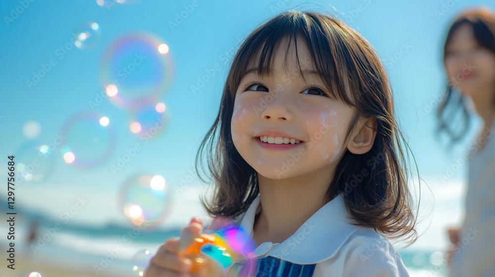 Joyful Girl Playing with Bubbles on a Sunny Day Joyful Girl Playing with Bubbles on a Sunny Day