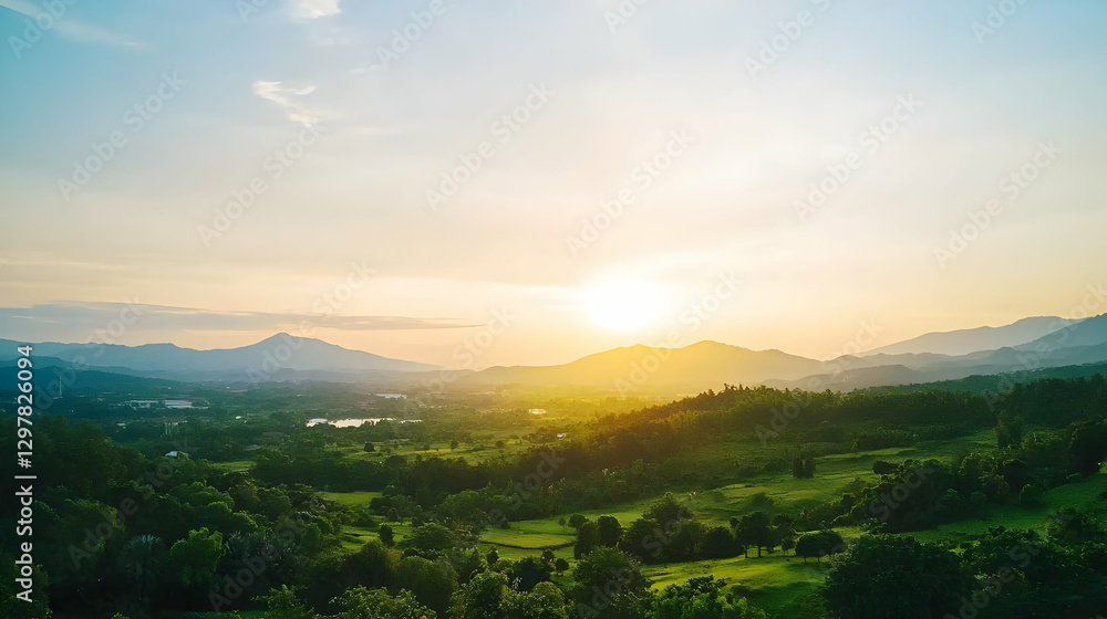 Fototapeta premium Golden Sunset Over Lush Green Valley And Rolling Hills With Dramatic Sky