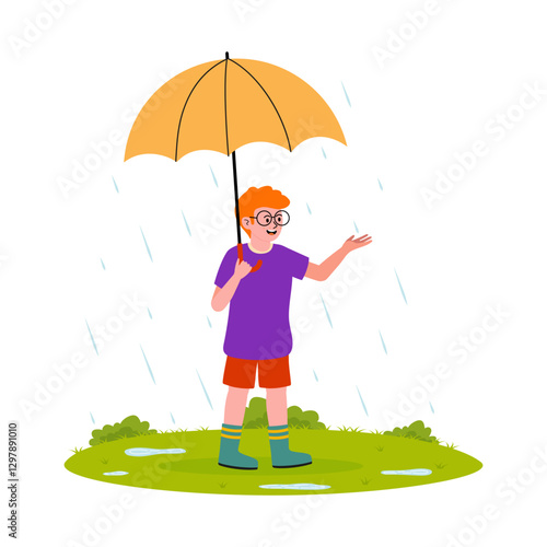 Boy with orange umbrella enjoys the rain while standing on green grass in a vibrant landscape