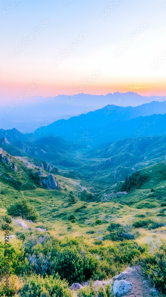 Mountain valley vista at sunrise. Possible use Stock photo for travel brochures, nature documentaries, or inspirational posters Mountain valley vista at sunrise. Possible use Stock photo for travel brochures, nature documentaries, or inspirational posters