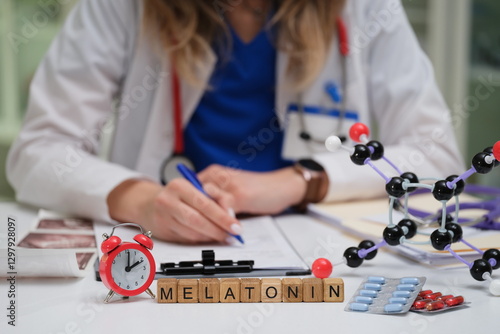 Obraz na płótnie A healthcare professional is currently conducting a detailed study on the effects of melatonin within a lab setting w salonie