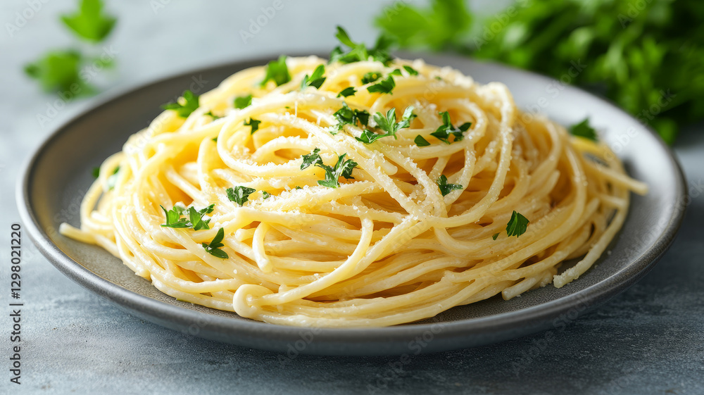 Plate of spaghetti with parsley and parmesan cheese. Plate of spaghetti with parsley and parmesan cheese.