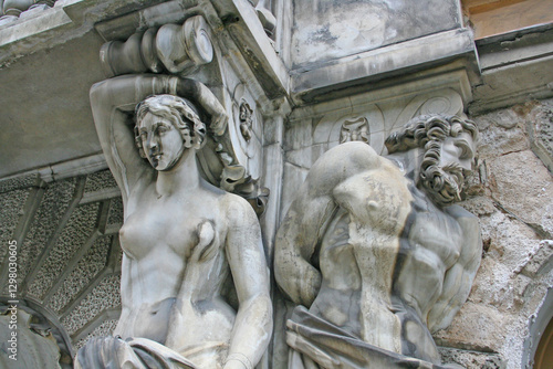 historic building with beautiful statues in need of renovation, saint petersburg, russia