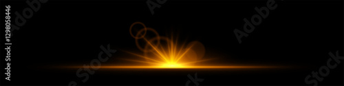 Glowing light burst on a dark background. Bright orange energy explosion with radiant beams and bokeh effects. Abstract illumination with dynamic flare and glowing particles