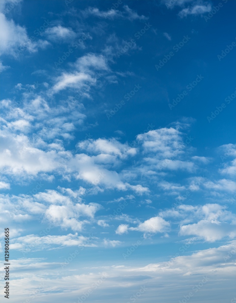 Fototapeta premium Subtle cloud texture: soft blue & white shades, like clear summer sky. Serene & airy. Ideal for calming backgrounds & light, delicate designs.