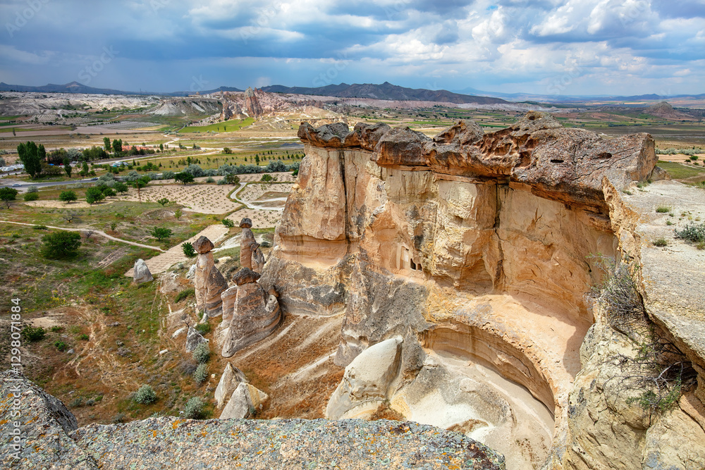 Discovering the breathtaking rock formations of Cappadocia under a cloudy sky