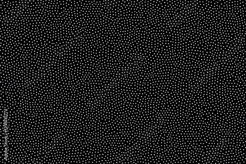 a black and white polka dot fabric with a small white dot pattern