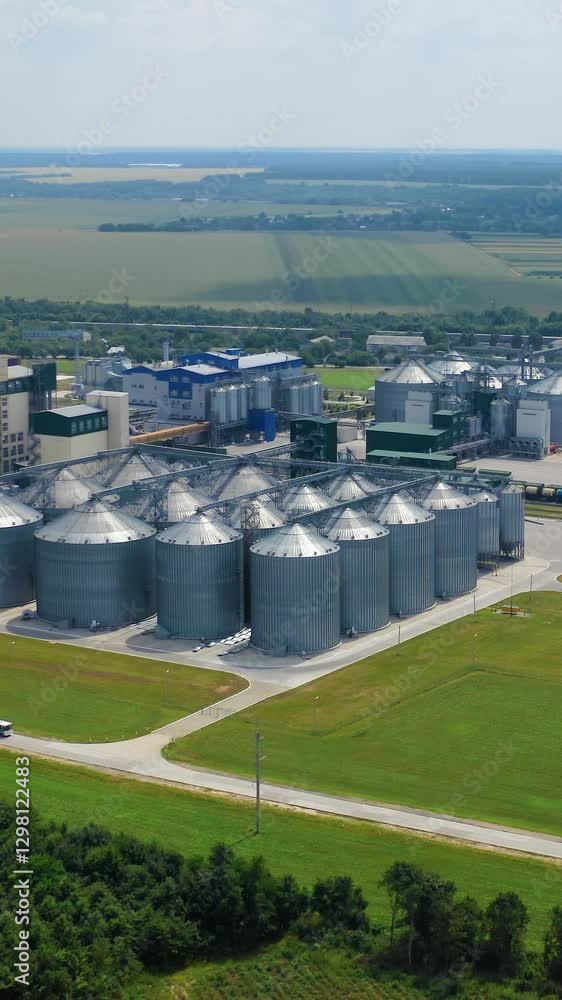 A big grain storage. A big grain tanks near highway