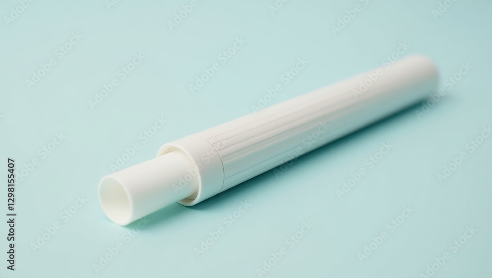 Nasal Stick. White plastic tube container cap open light blue backgrou Nasal Stick. White plastic tube container cap open light blue backgrou
