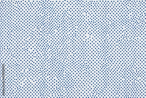 a close up of a blue and white polka dot pattern