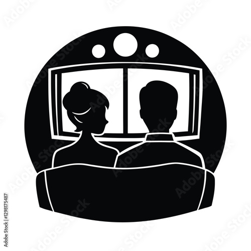 Silhouette of a romantic couple watching a movie together