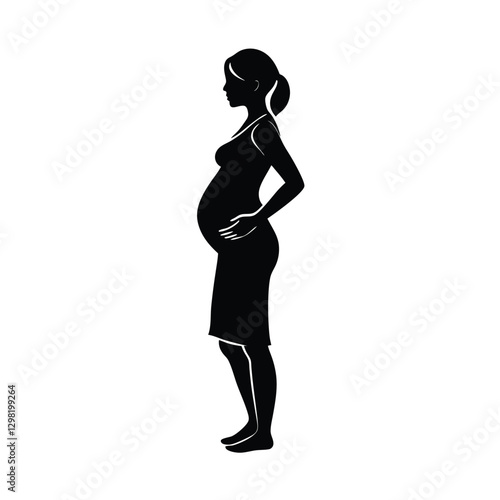 Elegant mother to be standing with arms gently around her belly