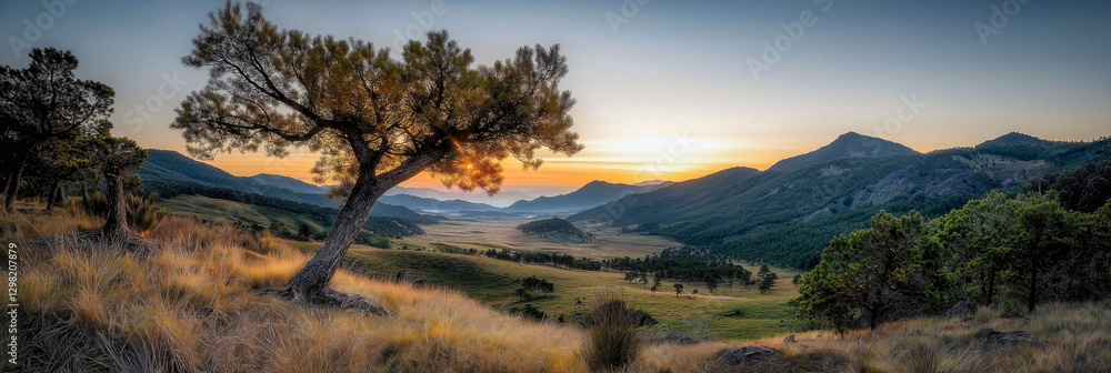 Obraz premium Tranquil Landscape: A serene landscape captures a vibrant sunrise over rolling hills, trees, and fields, painted with warm colors.