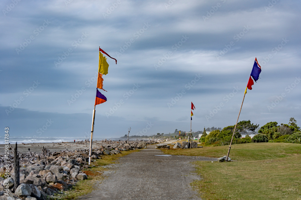 Fototapeta premium , hokitika flags on the beach