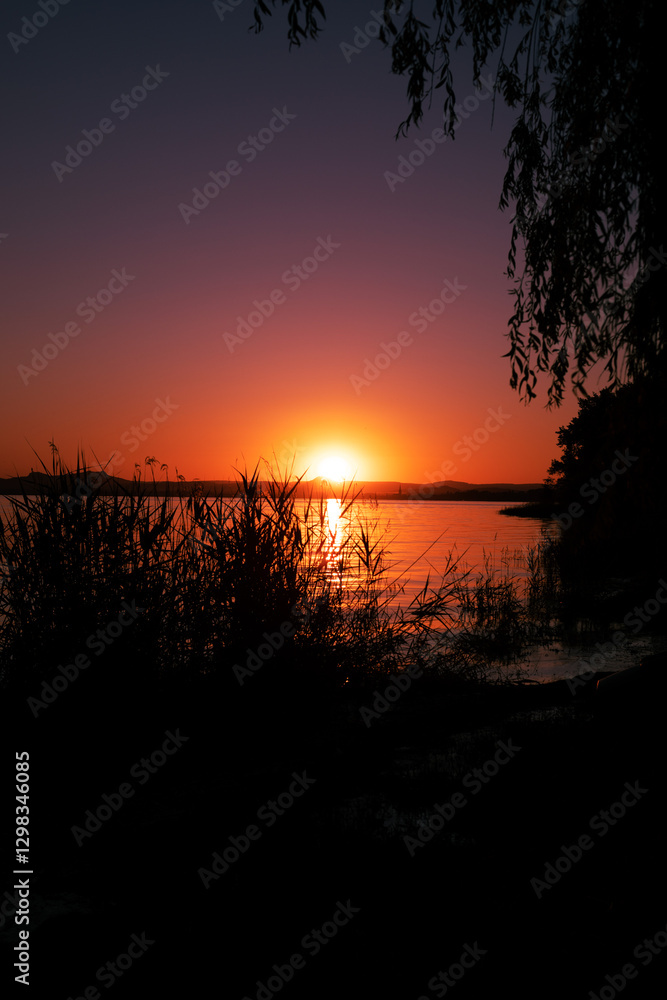 Obraz premium Sonnenuntergang am See