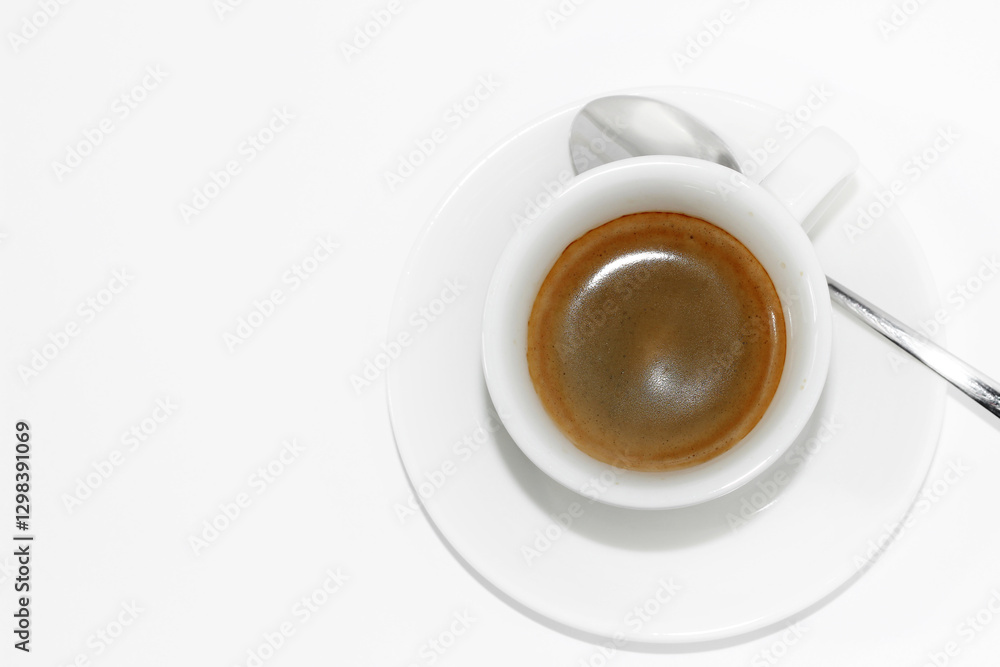 Espresso Shot in White Ceramic Cup Isolated on White Background. Cup of Coffee, Cafe. Espresso Shot in White Ceramic Cup Isolated on White Background. Cup of Coffee, Cafe.