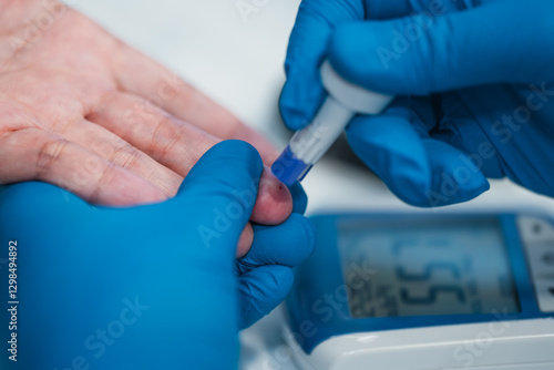 finger pricking for blood sugar level healthcare checkup