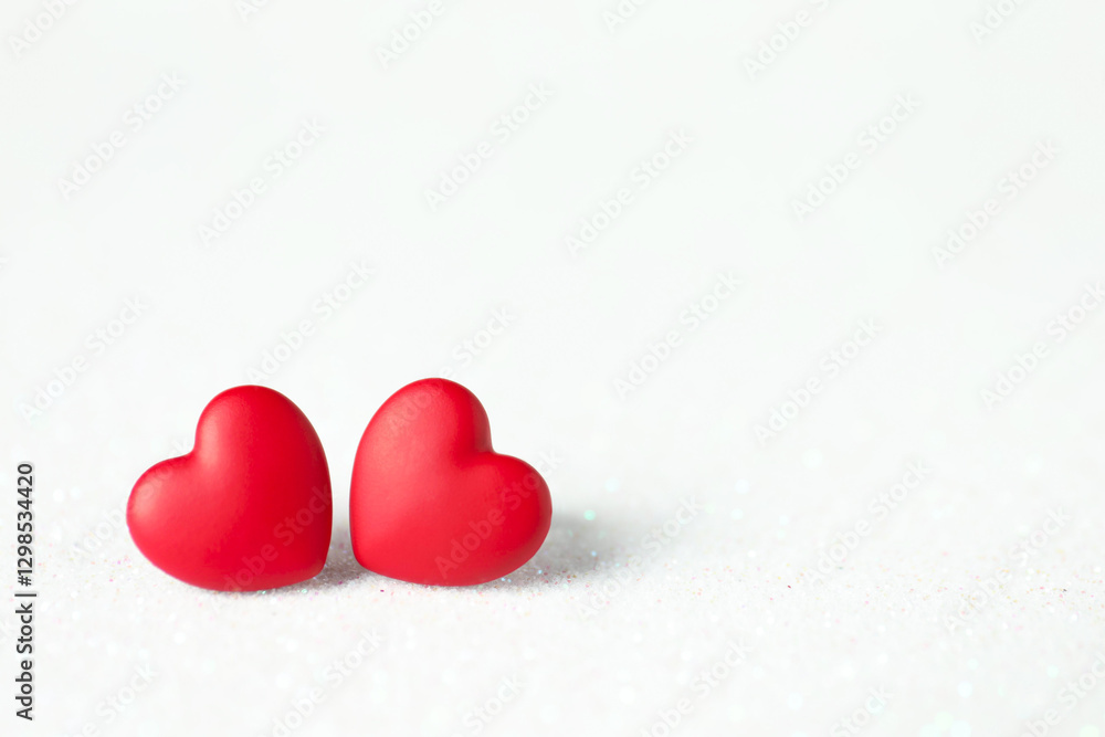 Fototapeta premium Red decorative hearts on white background, space for text. Happy Valentine's day