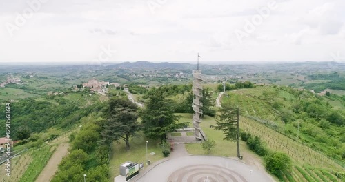 Aerial drone view pan of the Collio hills, Cormons, Nova Gorica near Gorizia. European Capital of Culture 2025. Typical local products vineyards and wines. Gonjače Tower places to visit and tradition.