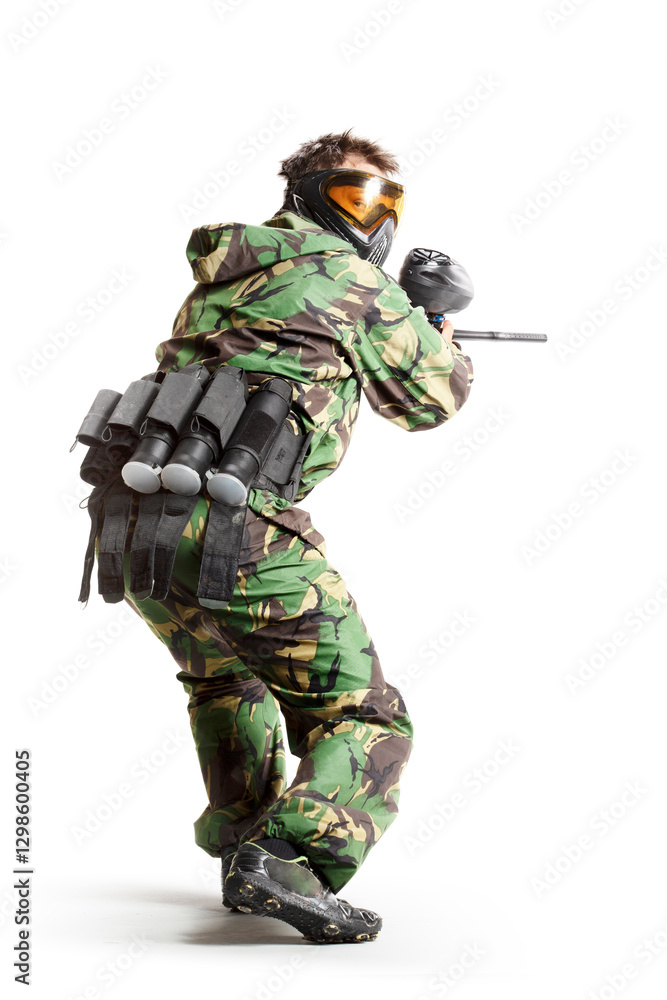 Painball player in action isolated om white bacground Painball player in action isolated om white bacground