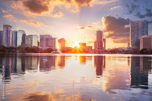 Obraz na płótnie Orlando, Florida, USA. Cityscape image of Orlando, Florida with reflection of the city skyline in the water at beautiful sunset. w salonie