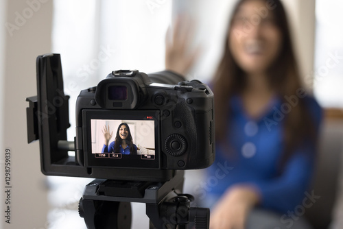 Konstfotografi Close up camera with display screen focused on Indian woman recording videovlog for social media, filming tutorial, provide information, share skills for on-line course or educational video