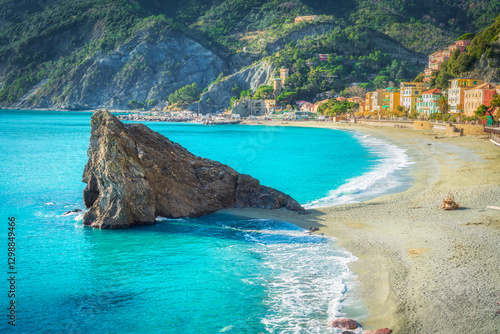 Fototapeta Naklejka Na Ścianę i Meble -  Beach and rock in front of the village of Monterosso al Mare in the Cinque Terre, Italy