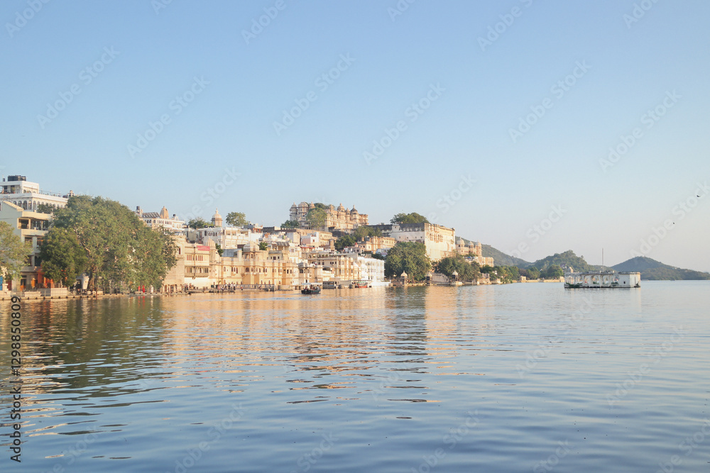 The City Palace by lake Pichola in Udaipur, the city of lakes in the Province of Rajasthan, India. The City Palace by lake Pichola in Udaipur, the city of lakes in the Province of Rajasthan, India.