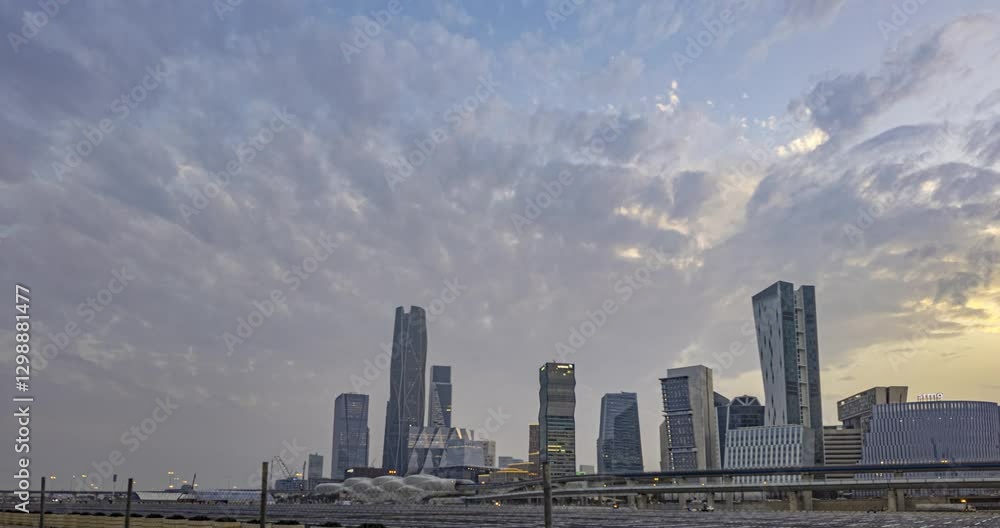 Stunning day to night timelapse of Riyadh with illuminated skyscrapers and busy streets Stunning day to night timelapse of Riyadh with illuminated skyscrapers and busy streets