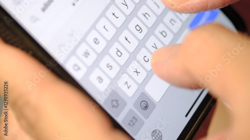 Hands typing text on smartphone close-up. Video 4K