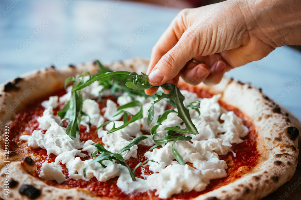 Delicious burrata pizza served on a table for dinner.