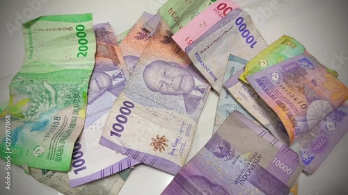 stacks of banknotes swaying in the wind